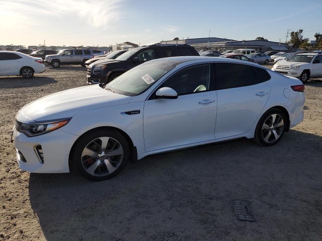 KIA OPTIMA SX 2018 with VIN 5XXGW4L20JG204668 - Photo from auction