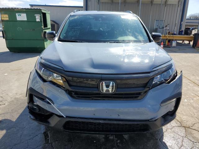Photo 5 from auction – 2022 HONDA PILOT TRAI with VIN 5FNYF6H80NB060688