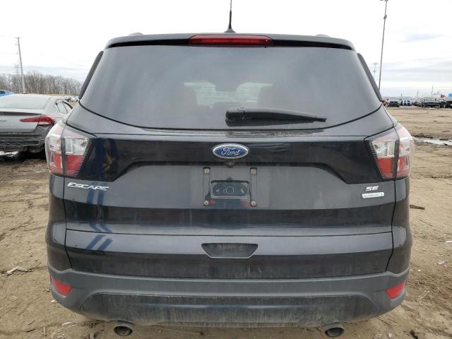 Photo 6 from auction – 2018 FORD ESCAPE SE with VIN 1FMCU0GD4JUD18770