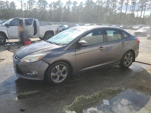 FORD FOCUS SE 2014 with VIN 1FADP3F21EL244324 - Photo from auction