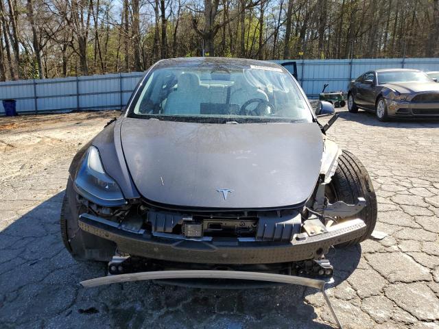 Photo 5 from auction – 2021 TESLA MODEL 3 with VIN 5YJ3E1EA8MF922125