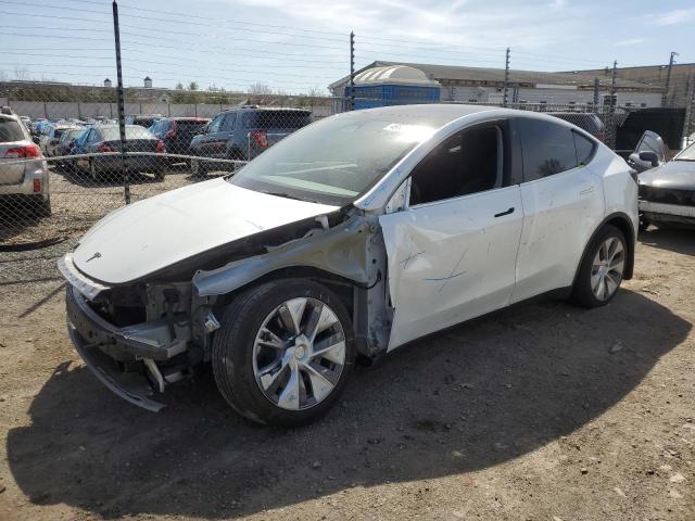 TESLA MODEL Y 2022 with VIN 7SAYGDEE3NA009665 - Photo from auction