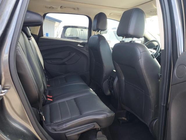 Photo 11 from auction – 2016 FORD ESCAPE TIT with VIN 1FMCU9JX2GUC48038