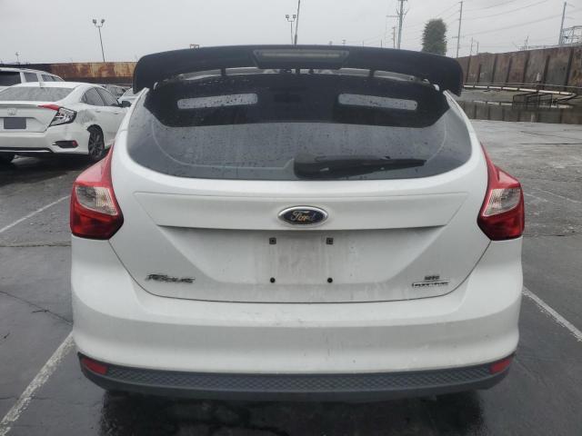 Foto 6 de la subasta – 2014 FORD FOCUS SE con VIN 1FADP3K29EL140220
