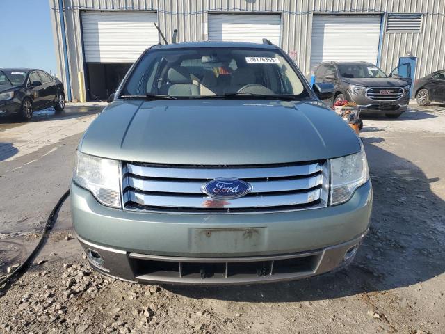 Photo 5 from auction – 2008 FORD TAURUS X S with VIN 1FMDK02W58GA13953