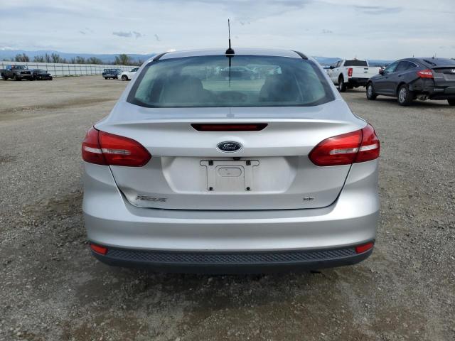 Снимка 6 от търг – 2016 FORD FOCUS SE с VIN 1FADP3F22GL270465