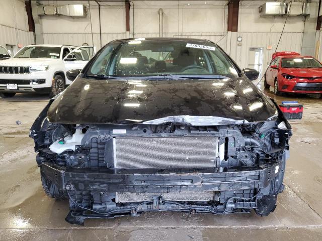 Photo 5 from auction – 2017 KIA FORTE LX with VIN 3KPFK4A75HE082091