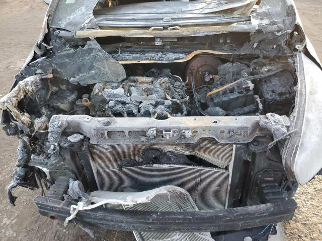 Photo 11 from auction – 2014 KIA RONDO with VIN KNAHU8A34E7006684