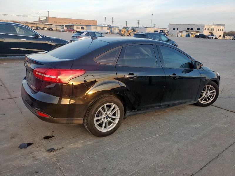 Снимка 3 от търг – 2017 FORD FOCUS SE с VIN 1FADP3F23HL291259