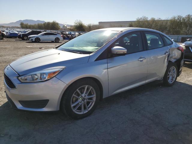 FORD FOCUS SE 2016 with VIN 1FADP3F22GL272362 - Photo from auction