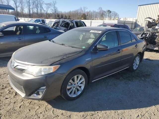 TOYOTA CAMRY HYBR 2012 with VIN 4T1BD1FK8CU018461 - Photo from auction