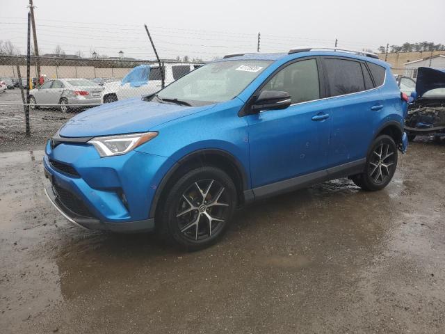 TOYOTA RAV4 SE 2016 with VIN JTMJFREV1GJ074527 - Photo from auction