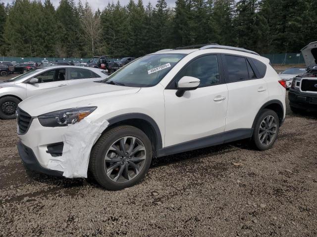 MAZDA CX-5 GT 2016 with VIN JM3KE4DY8G0619738 - Photo from auction