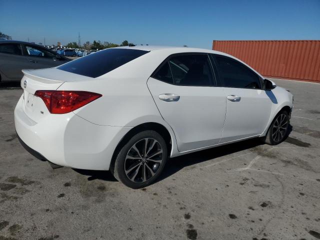 Photo 3 from auction – 2018 TOYOTA COROLLA L with VIN 5YFBURHEXJP769114