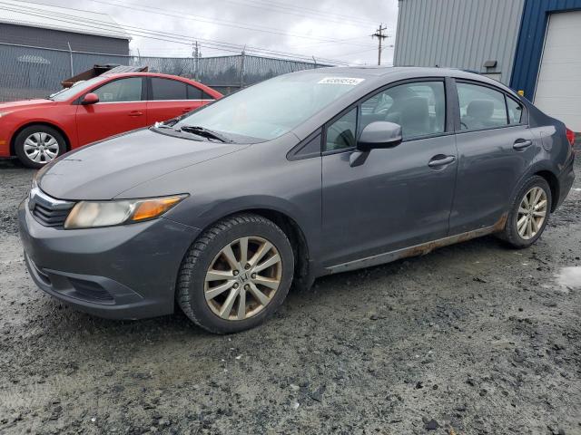 HONDA CIVIC LX 2012 with VIN 2HGFB2F51CH113170 - Photo from auction