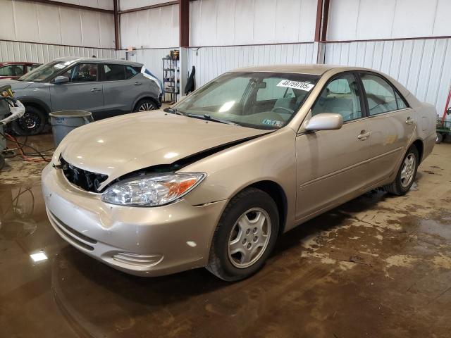 TOYOTA CAMRY LE 2002 with VIN 4T1BF32KX2U034784 - Photo from auction