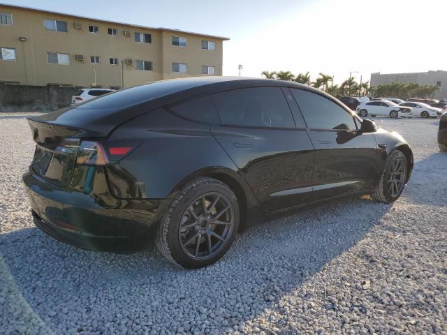 Photo 3 from auction – 2023 TESLA MODEL 3 with VIN 5YJ3E1EA9PF488060