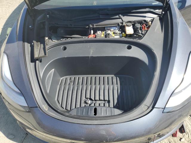 Photo 11 from auction – 2020 TESLA MODEL 3 with VIN 5YJ3E1EB2LF790910