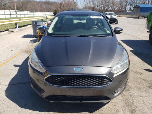Снимка 5 от търг – 2015 FORD FOCUS SE с VIN 1FADP3F21FL330444