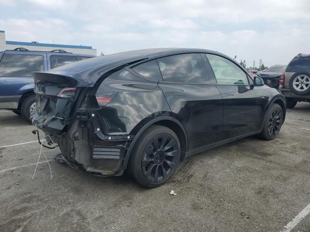 Photo 3 from auction – 2023 TESLA MODEL Y with VIN 7SAYGAEE1PF698125