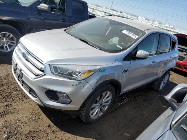 FORD ESCAPE TIT 2017 with VIN 1FMCU0J92HUB23295 - Photo from auction