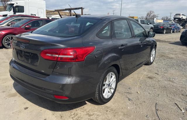 Снимка 4 от търг – 2016 FORD FOCUS SE с VIN 1FADP3F23GL296380