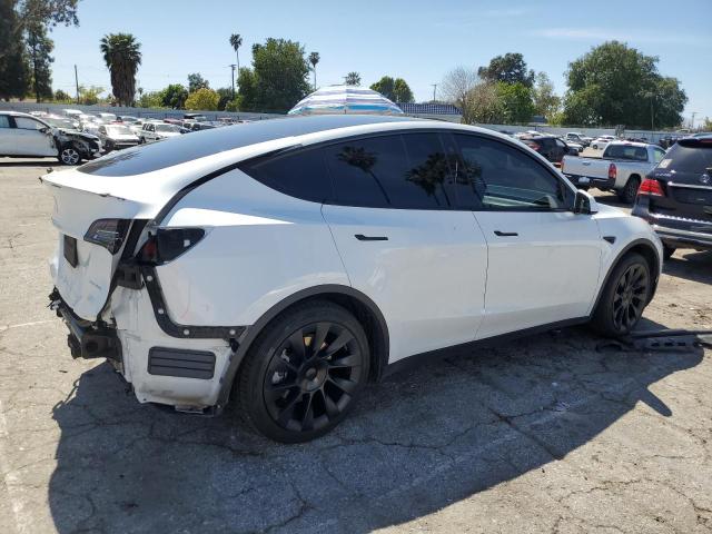 Photo 3 from auction – 2023 TESLA MODEL Y with VIN 7SAYGAEE2PF695962