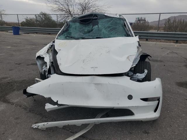 Photo 5 from auction – 2021 TESLA MODEL 3 with VIN 5YJ3E1EA9MF969079