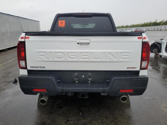 Photo 6 from auction – 2024 HONDA RIDGELINE with VIN 5FPYK3F17RB025370
