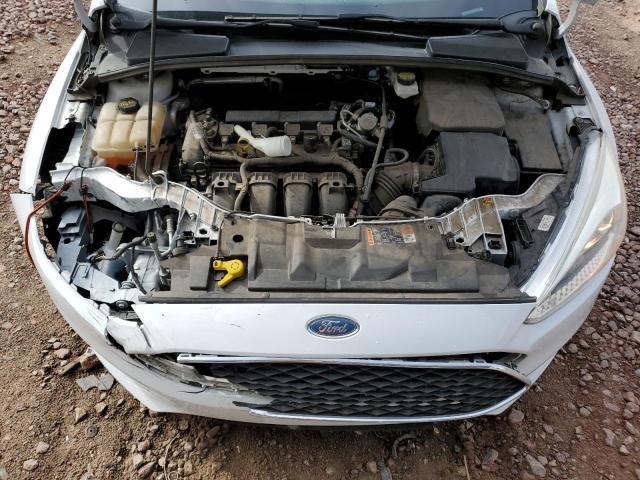 Photo 11 from auction – 2017 FORD FOCUS S with VIN 1FADP3E24HL348277