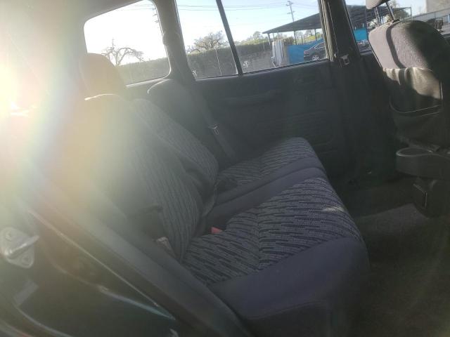 Photo 11 from auction – 1999 TOYOTA RAV4 with VIN JT3GP10V5X7060132