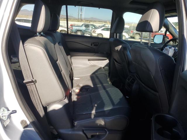 Photo 11 from auction – 2022 HONDA PASSPORT E with VIN 5FNYF8H09NB027162
