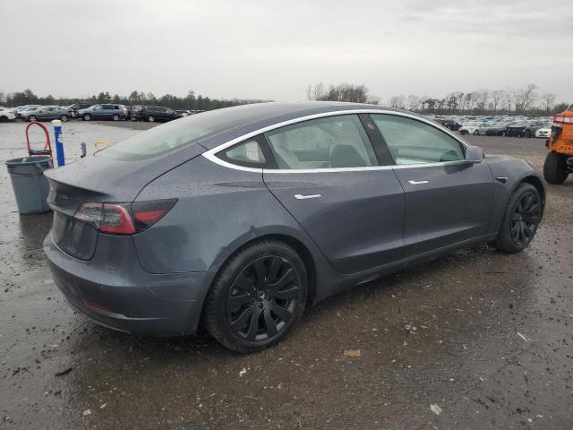 Снимка 3 от търг – 2018 TESLA MODEL 3 с VIN 5YJ3E1EAXJF166731