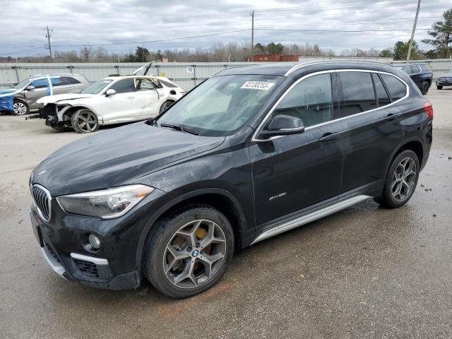 BMW X1 XDRIVE2 2018 with VIN WBXHT3C36J5F90927 - Photo from auction