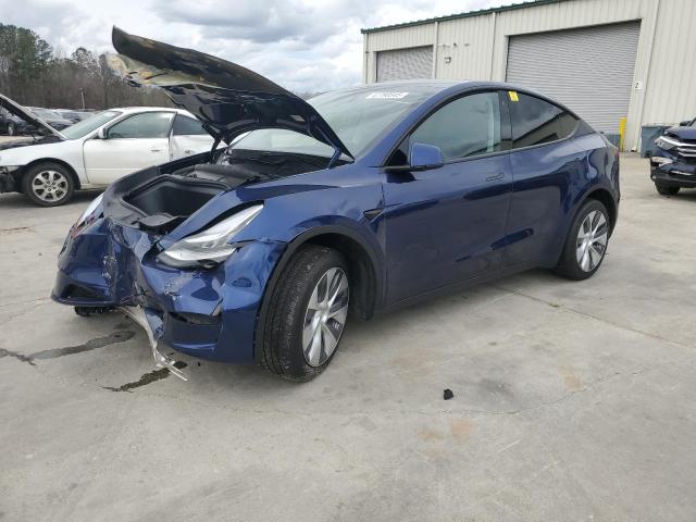 TESLA MODEL Y 2023 with VIN 7SAYGDEE2PA096705 - Photo from auction