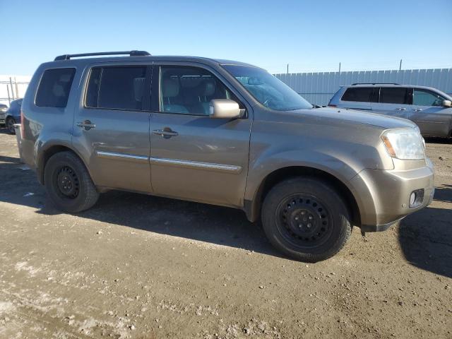 Photo 4 from auction – 2010 HONDA PILOT TOUR with VIN 5FNYF4H96AB504745