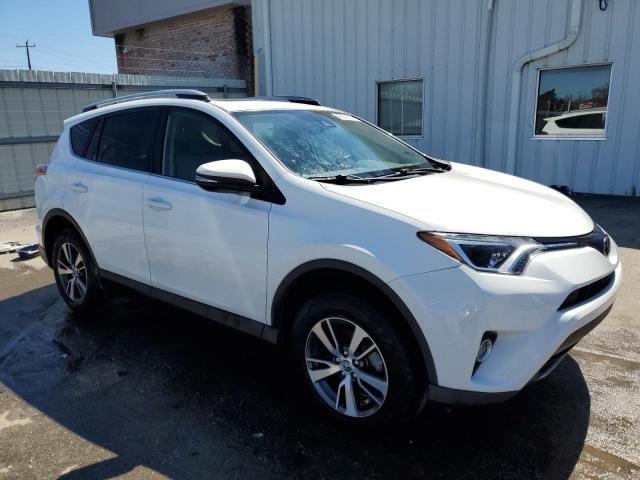 Photo 4 from auction – 2017 TOYOTA RAV4 XLE with VIN JTMWFREV8HJ110155