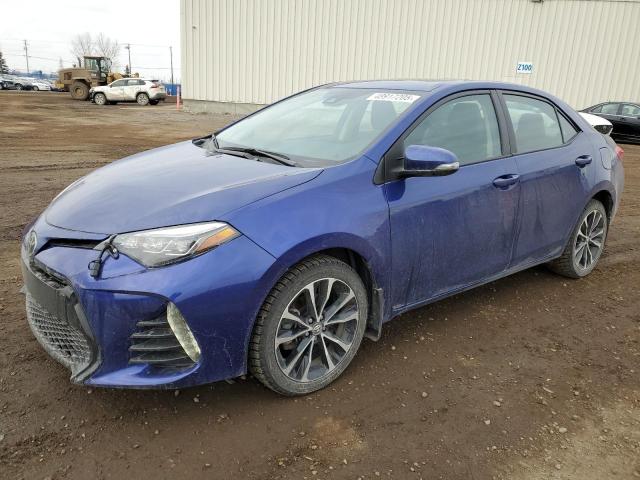 TOYOTA COROLLA L 2019 with VIN 2T1BURHEXKC187452 - Photo from auction