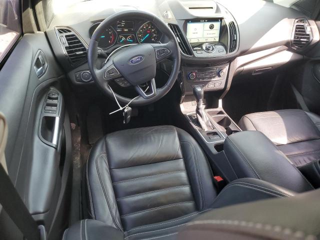Photo 8 from auction – 2017 FORD ESCAPE TITANIUM with VIN 1FMCU0J97HUD83613