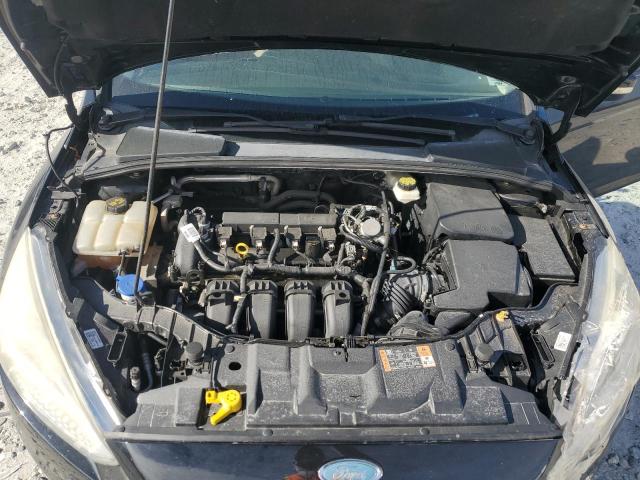 Foto 11 de la subasta – 2017 FORD FOCUS SE con VIN 1FADP3F23HL302051