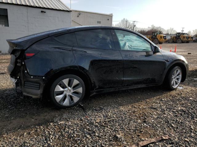 Photo 3 from auction – 2022 TESLA MODEL Y with VIN 7SAYGAEE5NF376911