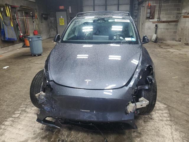 Снимка 5 от търг – 2024 TESLA MODEL Y с VIN 7SAYGAEE8RF063468