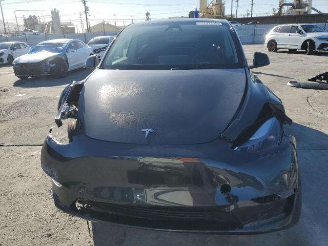 Photo 5 from auction – 2025 TESLA MODEL Y with VIN 7SAYGDED3SF228955