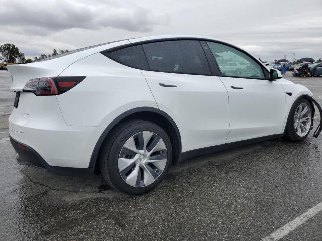 Снимка 3 от търг – 2023 TESLA MODEL Y с VIN 7SAYGDEE6PF628928