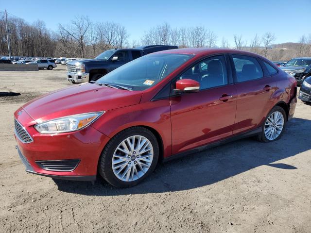 FORD FOCUS SE 2016 with VIN 1FADP3F21GL273714 - Photo from auction