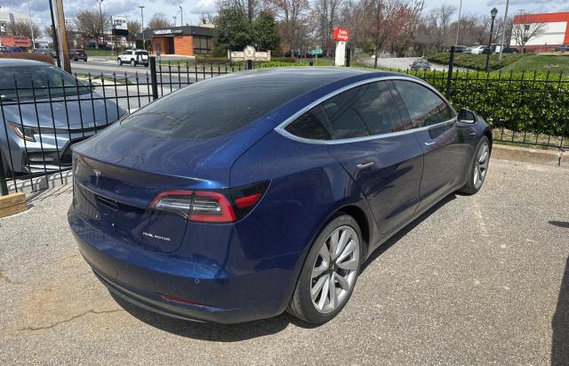 Снимка 4 от търг – 2018 TESLA MODEL 3 с VIN 5YJ3E1EB0JF117496