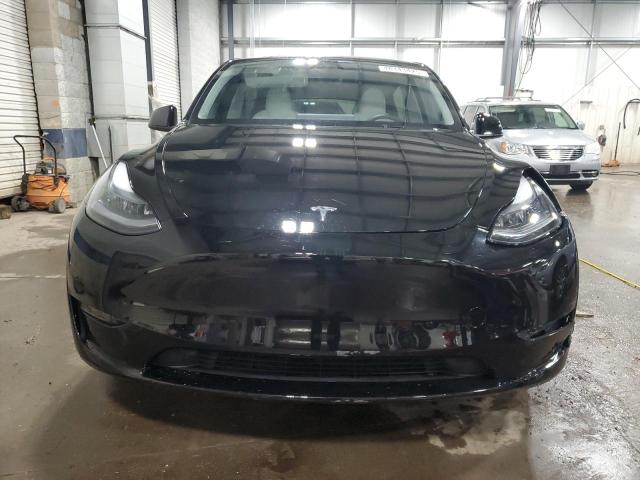 Photo 5 from auction – 2023 TESLA MODEL Y with VIN 7SAYGAEE7PF904807