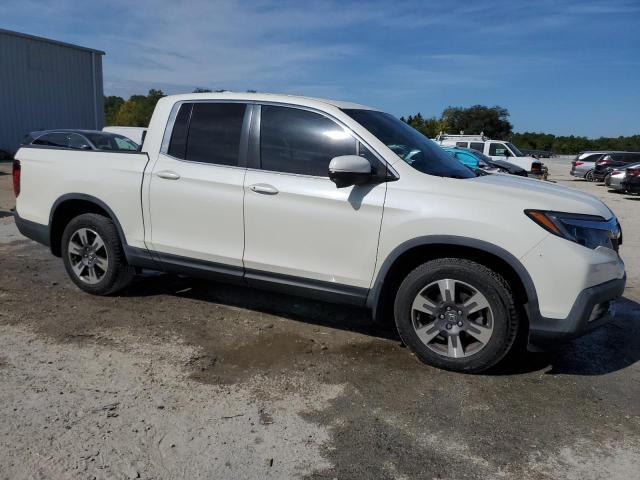 Photo 4 from auction – 2019 HONDA RIDGELINE with VIN 5FPYK2F62KB002624