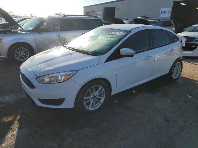 FORD FOCUS SE 2017 with VIN 1FADP3F24HL237386 - Photo from auction