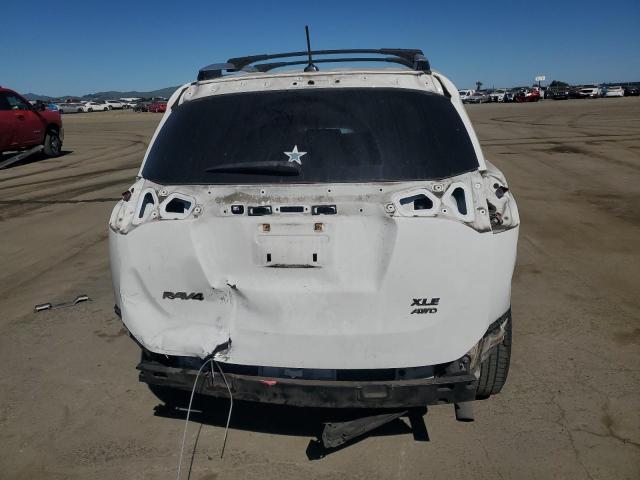 Photo 6 from auction – 2014 TOYOTA RAV4 XLE with VIN JTMRFREV3ED050373
